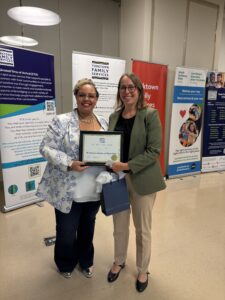 YWHO & CAMH Rep receiving Community Partnership award from Yorktown Family Services