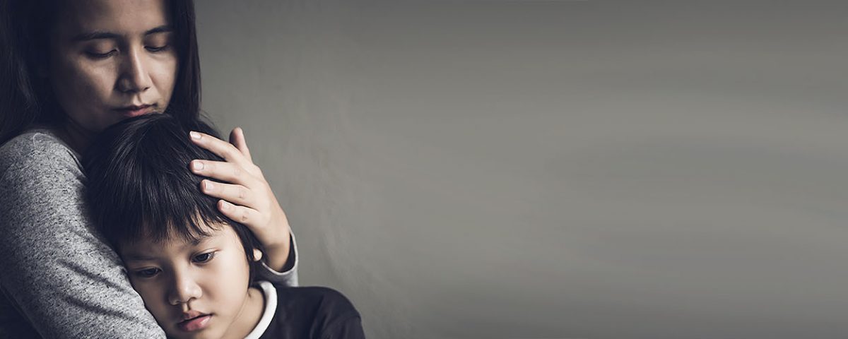 mother comforting child