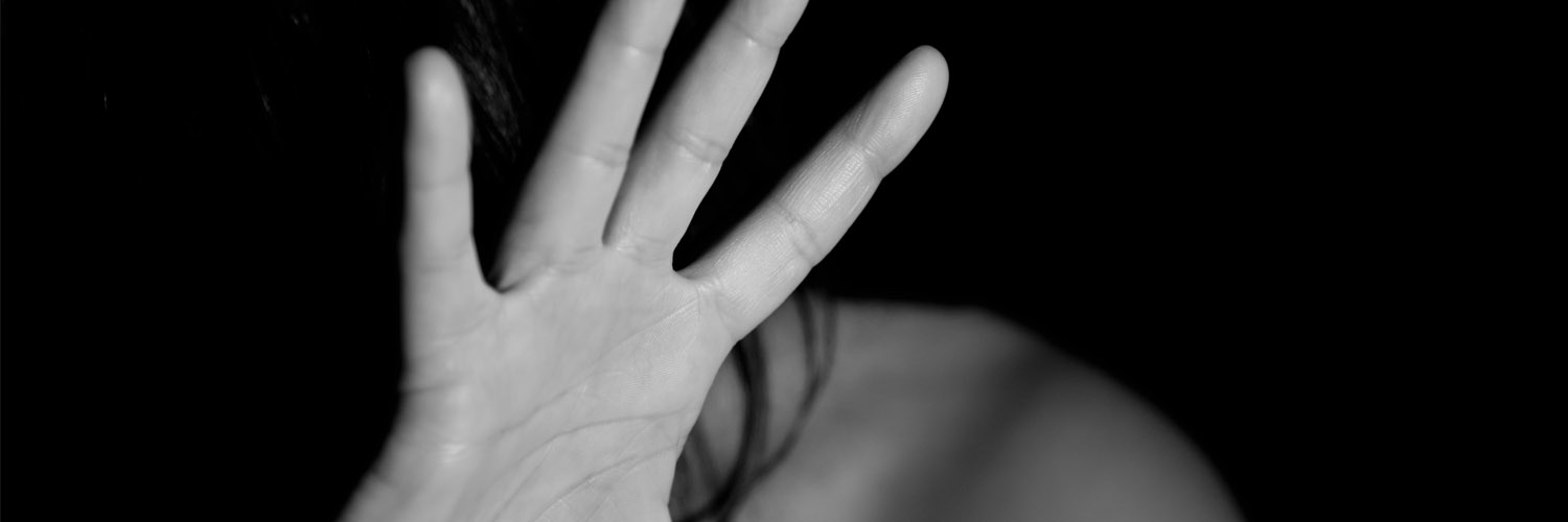 Woman's hand stopping violence