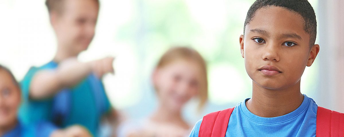 youth being bullied by three peers