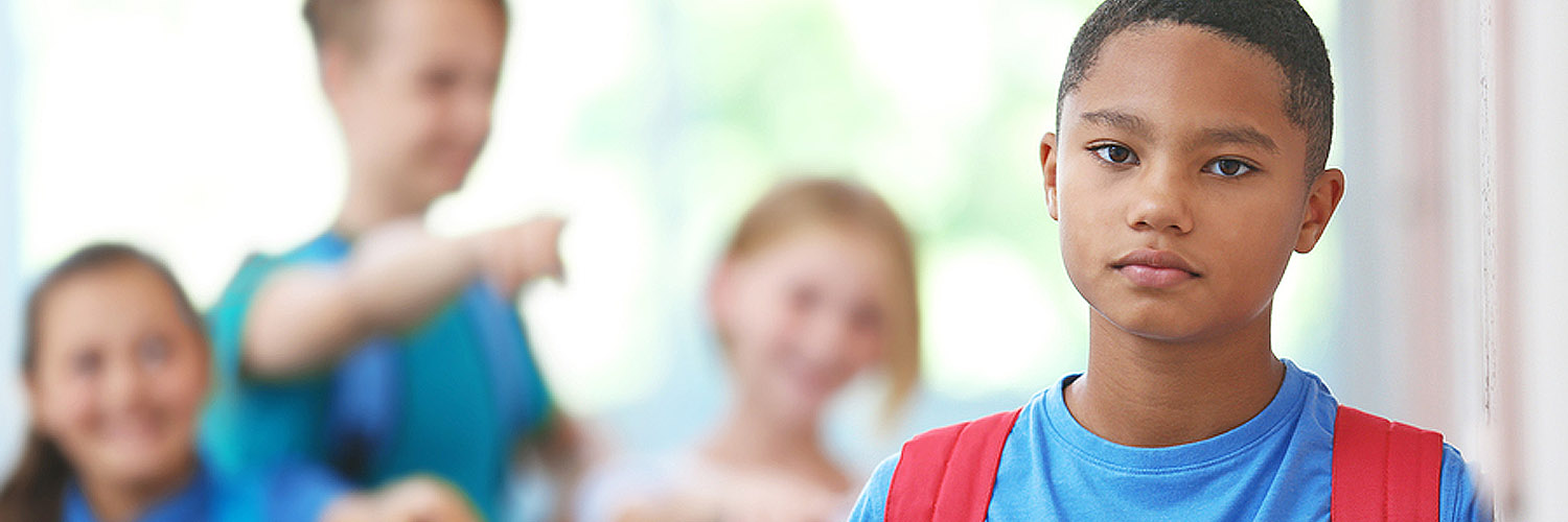 youth being bullied by three peers