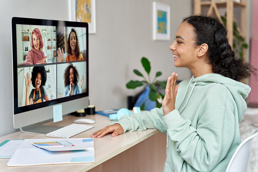 African American Teen Girl with friends on a virtual meeting