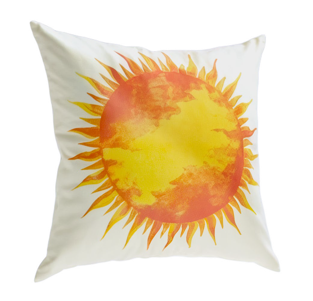 square pillow with an orange and yellow sun design